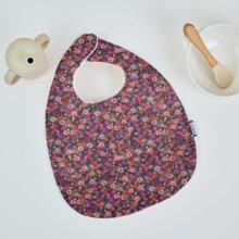 Coated fabric bib hippie fleurie
