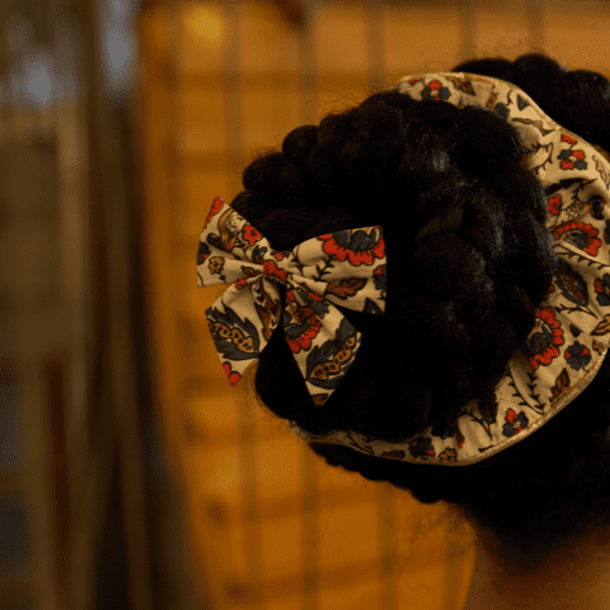 Bow tie hair slide plumes d'été