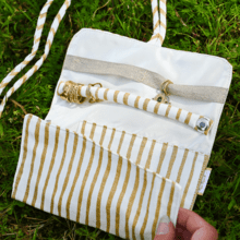 Jewelry pouch rayé or blanc