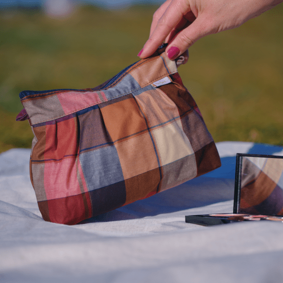 Pleated clutch bag ruby lurex tartan