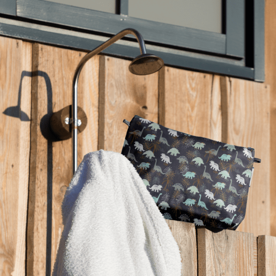 Cosmetic bag with flap jurassic dino marine