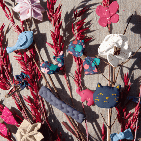 Mini bow tie clip fuchsia pailleté