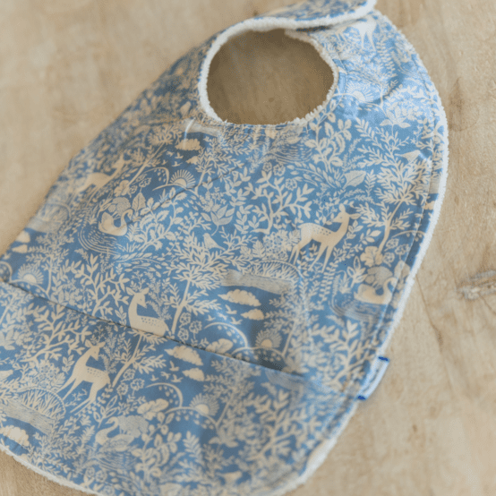 Coated fabric bib toile de biche
