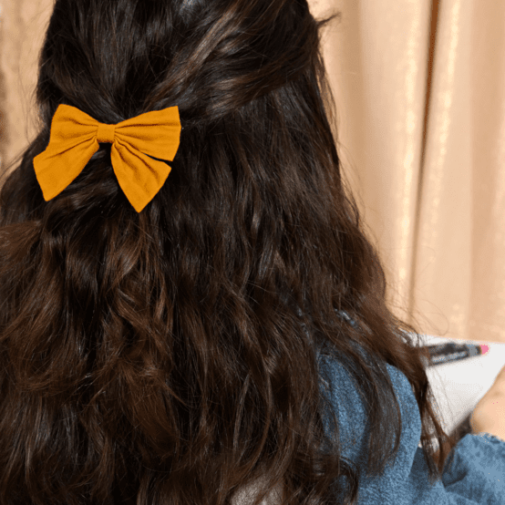 Bow tie hair slide ochre