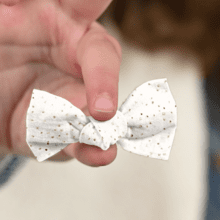 Small bow hair slide white sequined