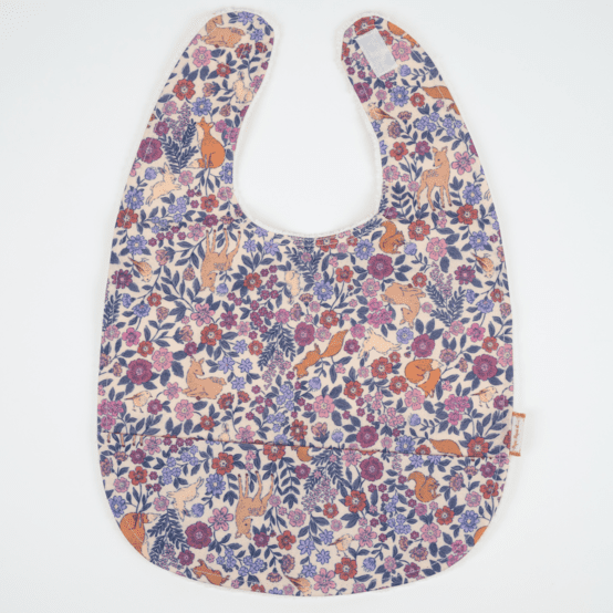 Coated fabric bib comptine enchantée rose