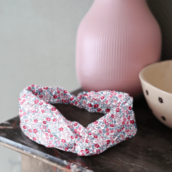 crossed headband rose grenadine