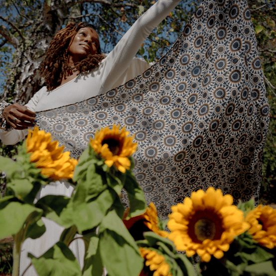 Pom pom scarf attrape soleil