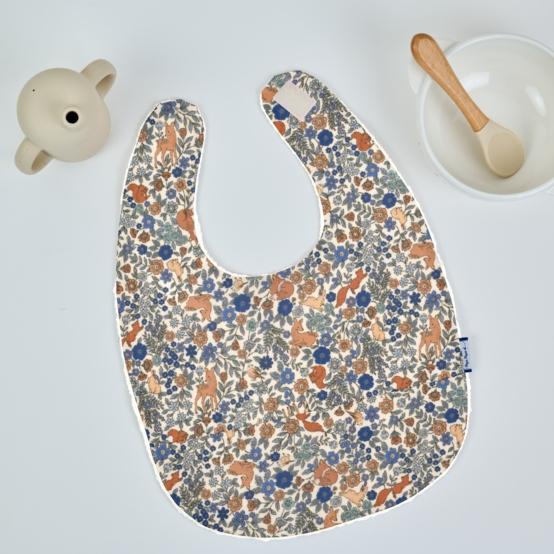 Coated fabric bib comptine enchantée