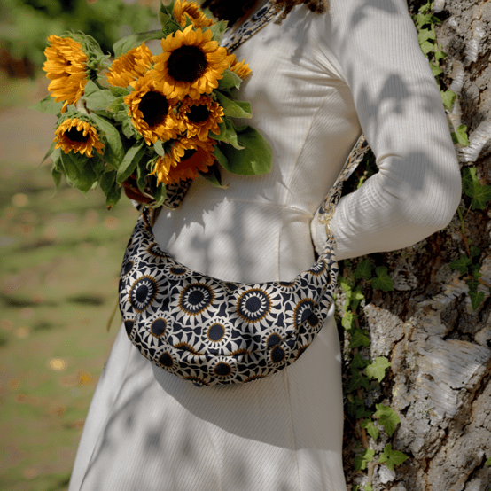 Half-moon bag attrape soleil