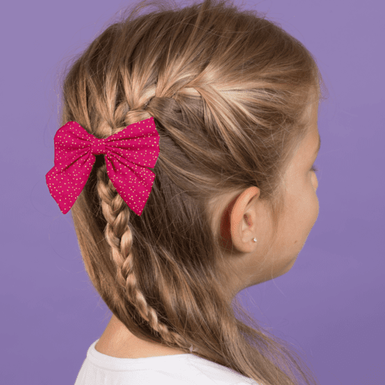 Bow tie hair slide fuchsia pailleté