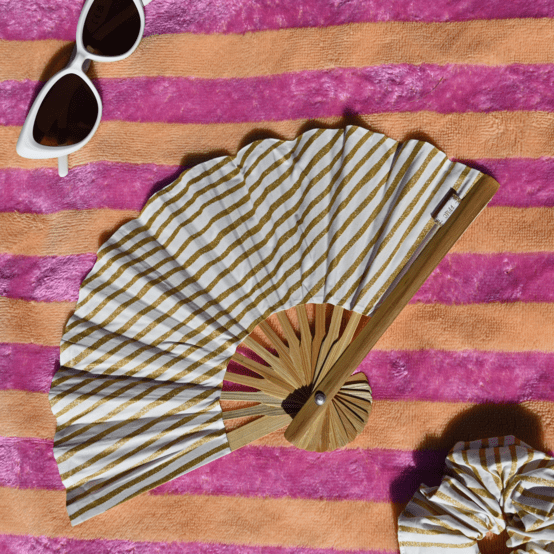 Hand-held fan rayé or blanc