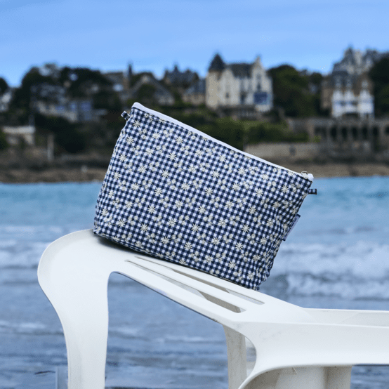 Cosmetic bag with flap navy embroidered gingham