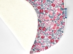 Coated fabric bib rose grenadine
