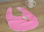 Coated fabric bib neon pink gingham