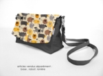 Flap of shoulder bag yellow sheep