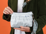 Pleated clutch bag striped blue gray glitter