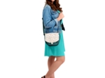 Flap of small shoulder bag sea side