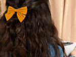 Bow tie hair slide ochre