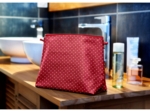Cosmetic bag with flap red spots
