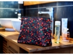 Cosmetic bag with flap huppette fleurie
