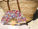 Hand-held fan tutti fleuri