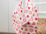 Coated fabric bib petits coeurs
