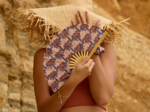 Hand-held fan palmeraie