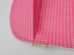 Coated fabric bib neon pink gingham