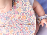 Coated fabric bib comptine enchantée rose