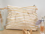 Pleated clutch bag rayé or blanc