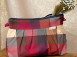 Pleated clutch bag ruby lurex tartan