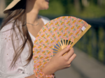 Hand-held fan shanti