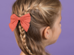 Bow tie hair slide coral lurex gauze