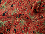Cotton fabric gold poinsettia ex1106