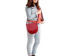 Flap of small shoulder bag red spots