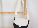 Flap of small shoulder bag beige pailleté