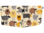 Flap of shoulder bag yellow sheep