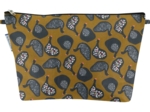 Cosmetic bag with flap hen facet