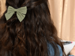 Bow tie hair slide almond green with golden dots gauze