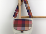 Flap of small shoulder bag ruby lurex tartan