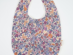 Coated fabric bib comptine enchantée rose