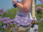 Flap of small shoulder bag lavandula