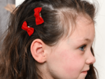 Small bows hair clips red