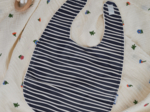 Coated fabric bib striped  ivory navy