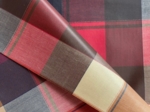 Coated fabric ruby lurex tartan