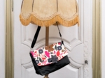 Flap of shoulder bag champ floral