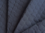 Quilted fabric black hexagonal quilt