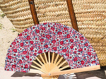 Hand-held fan rouge corolle
