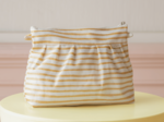 Pleated clutch bag rayé or blanc